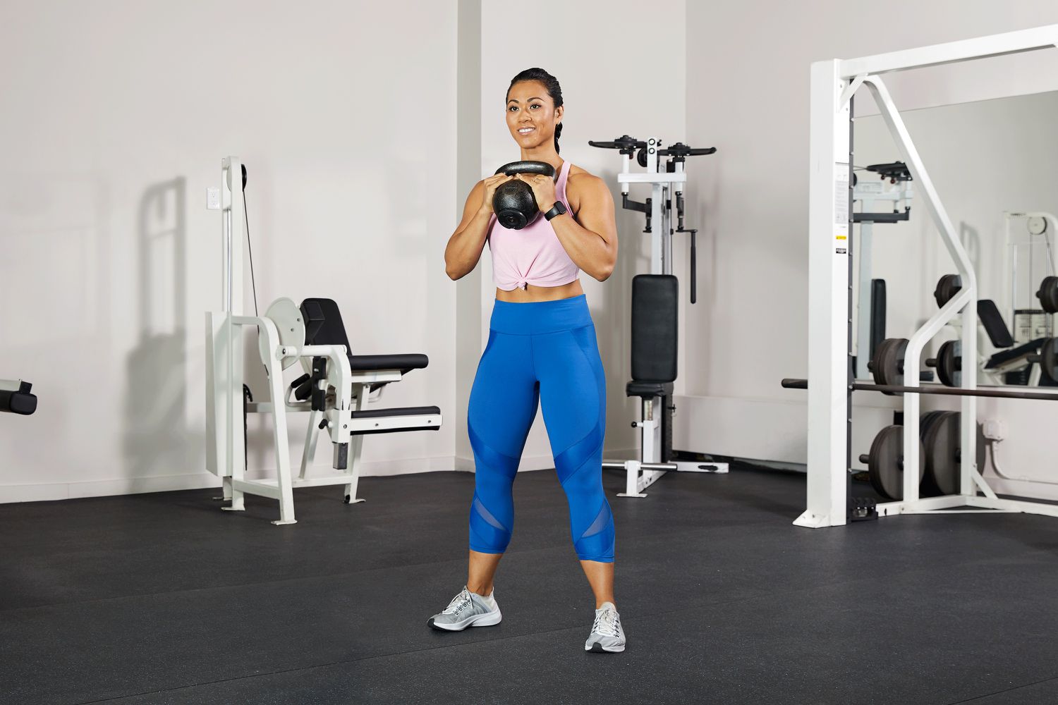 vrouw die een go doetBlet squat